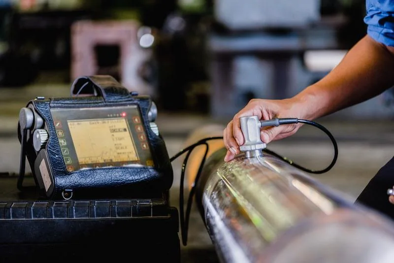 Ultrasonic testing equipment in use